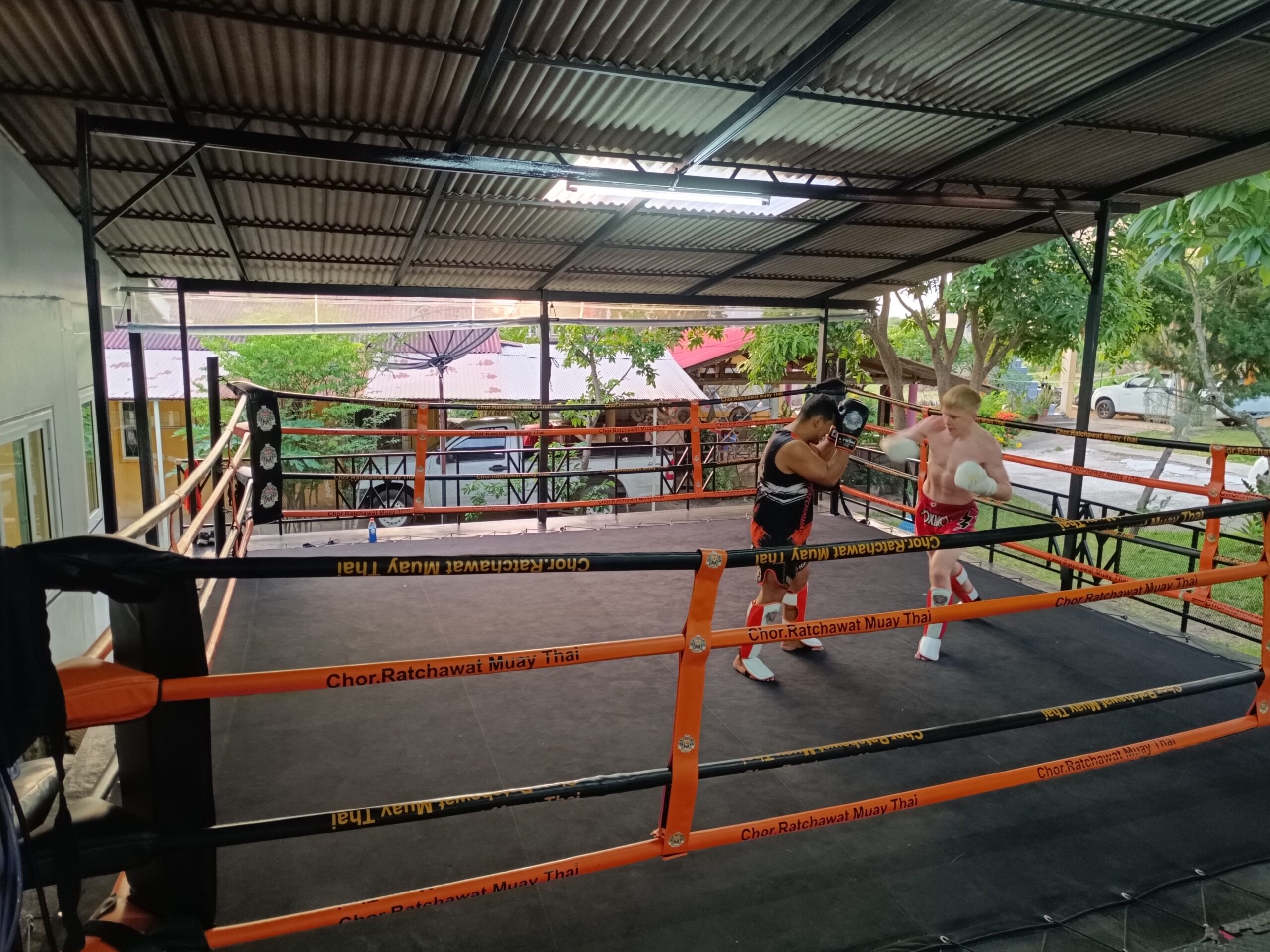 Authentic Muay Thai Training in Thailand Muay Thai fighter training with pads in Thailand camp